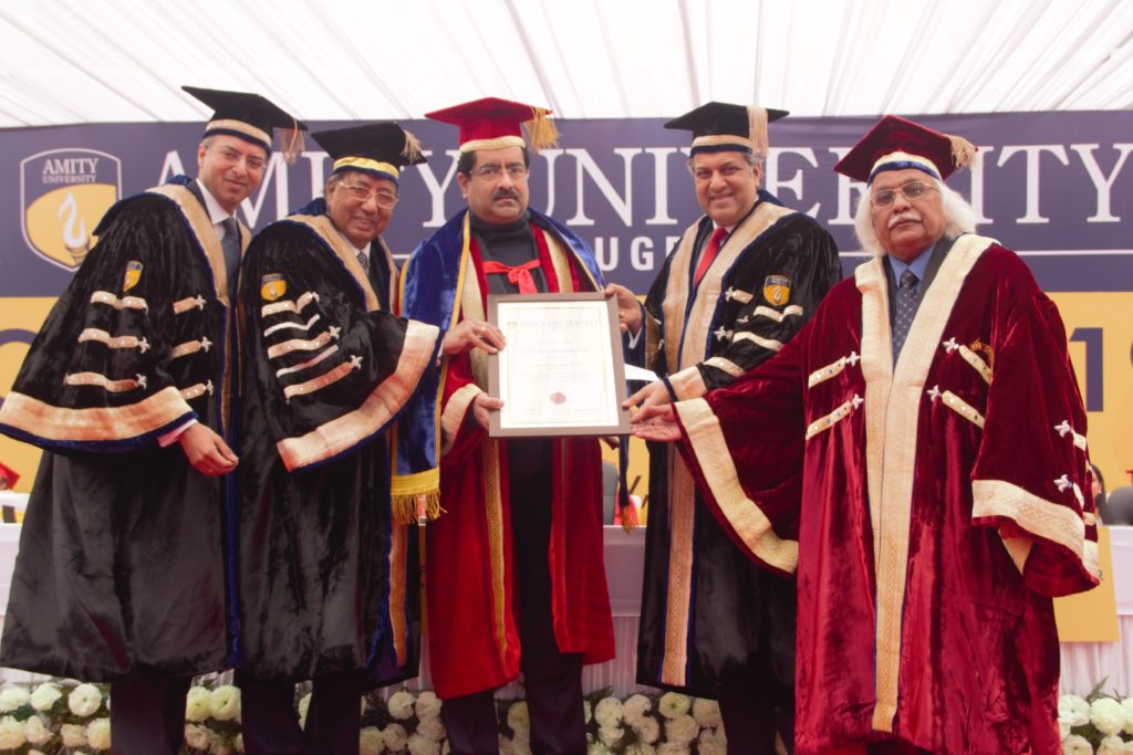 Shri Kumar Manglam Birla, Chairman, Aditya Birla Group Receiving the Honorary Doctorate from Dr. Aseem Chauhan at Amity University Gurugram Convocation 2019
